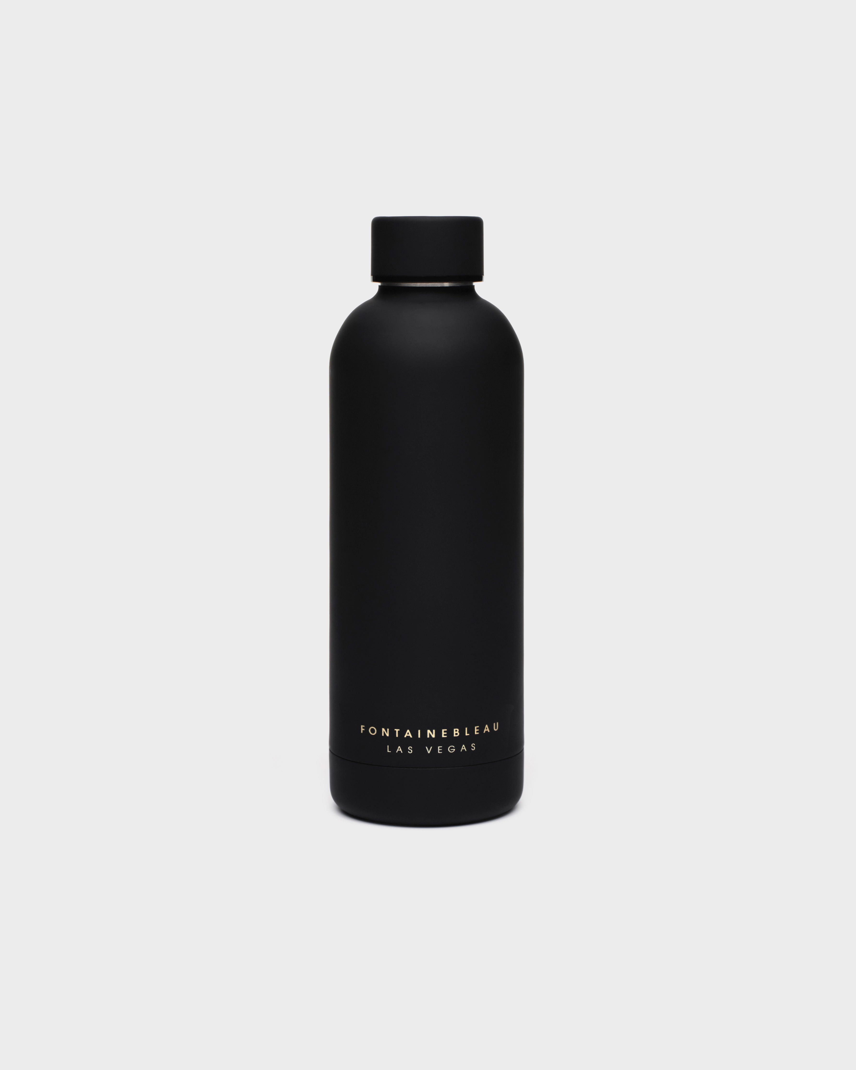 Black water bottle with 'Fontainebleau Las Vegas' branding on a light gray background