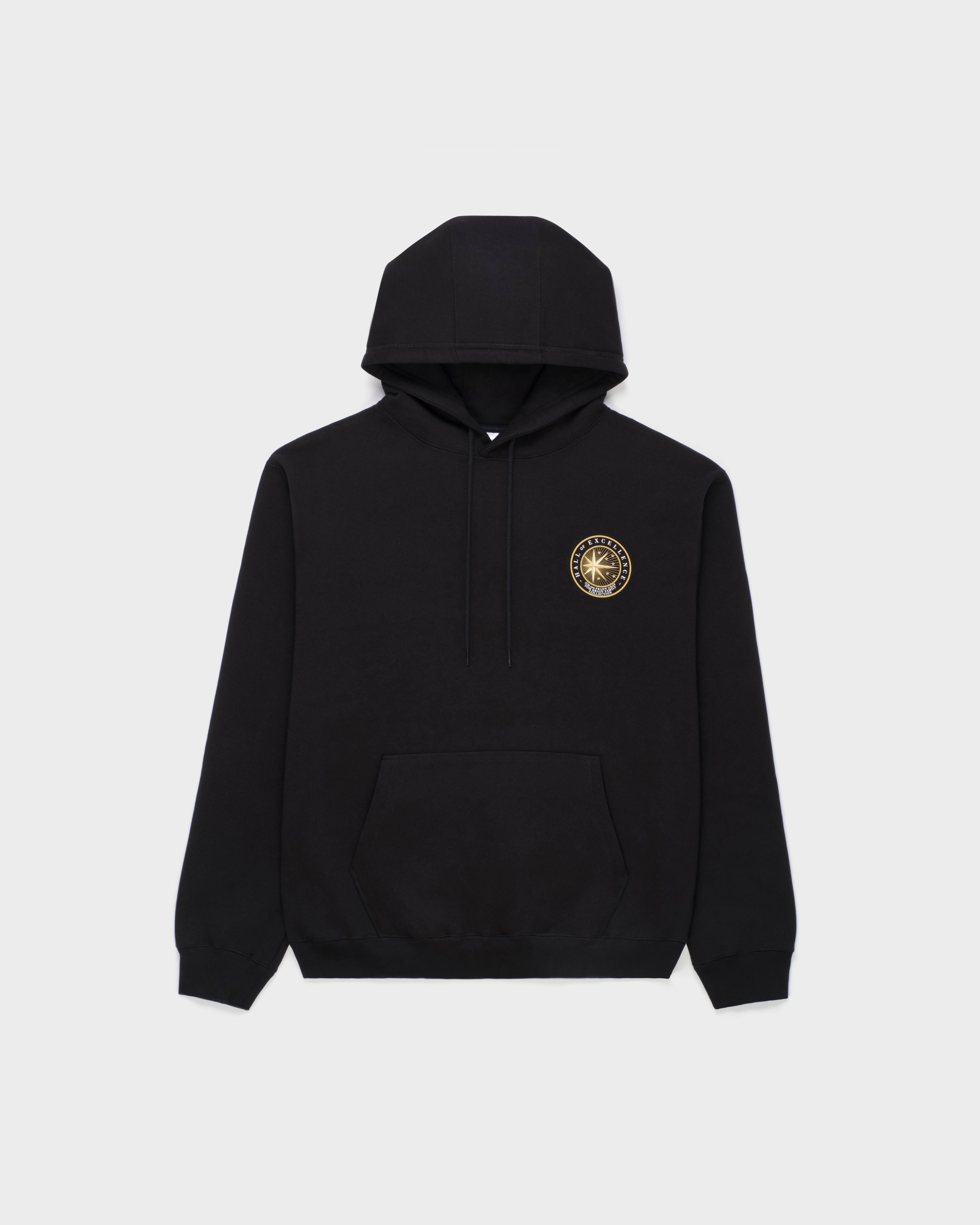 Black hoodie with a gold Hall of Excellence emblem on a light gray background
